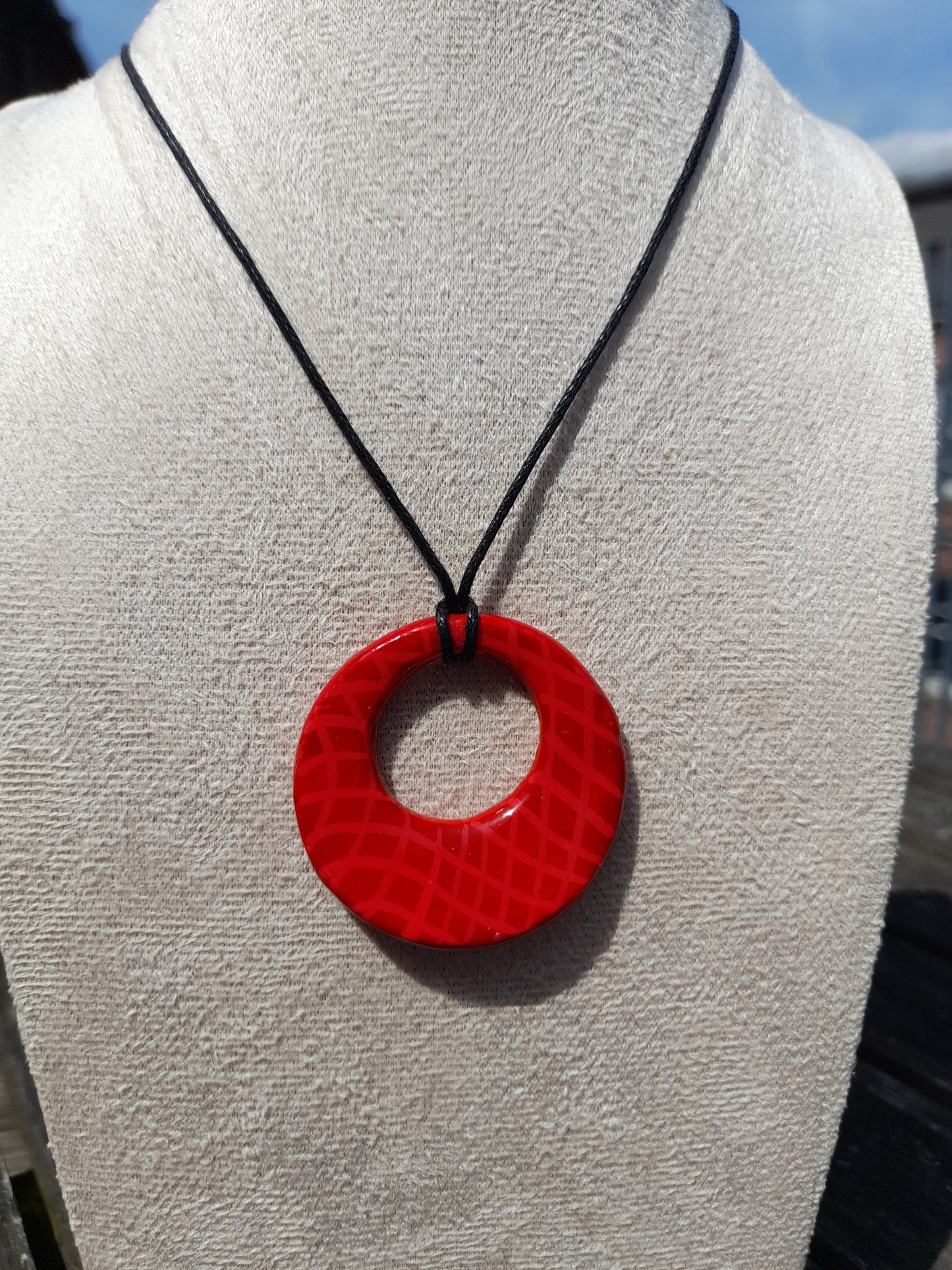 red crosshatch round clay pendant cord necklace