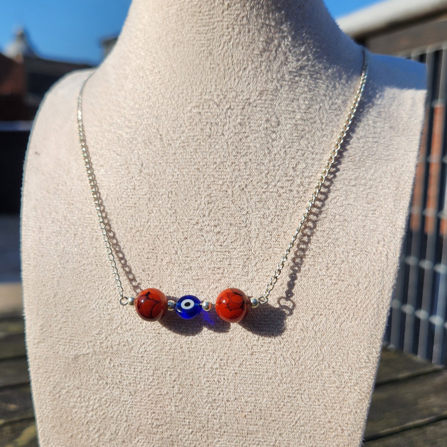 red and blue evil eye beaded silver chain necklace