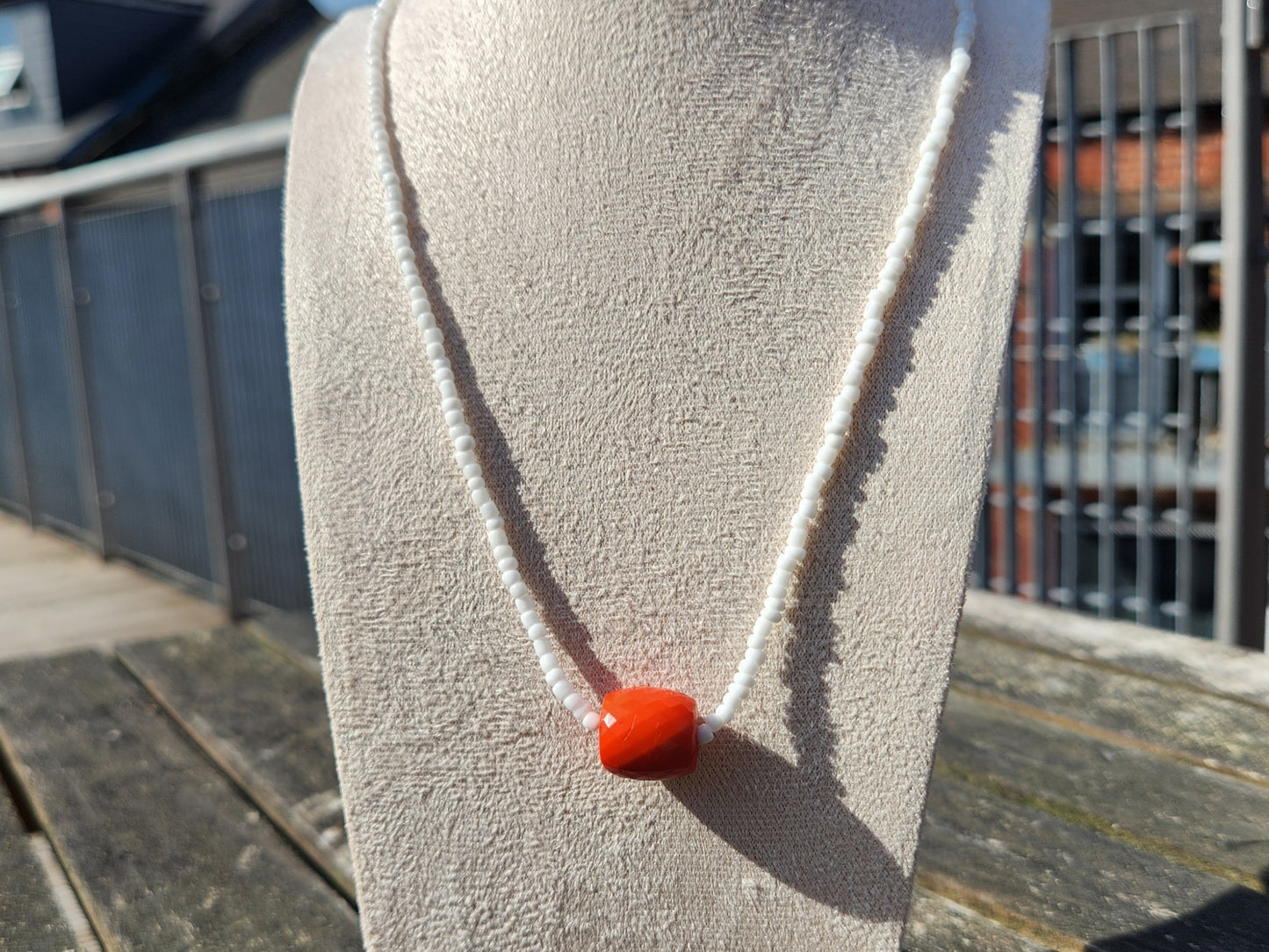 white and orange glass beaded necklace
