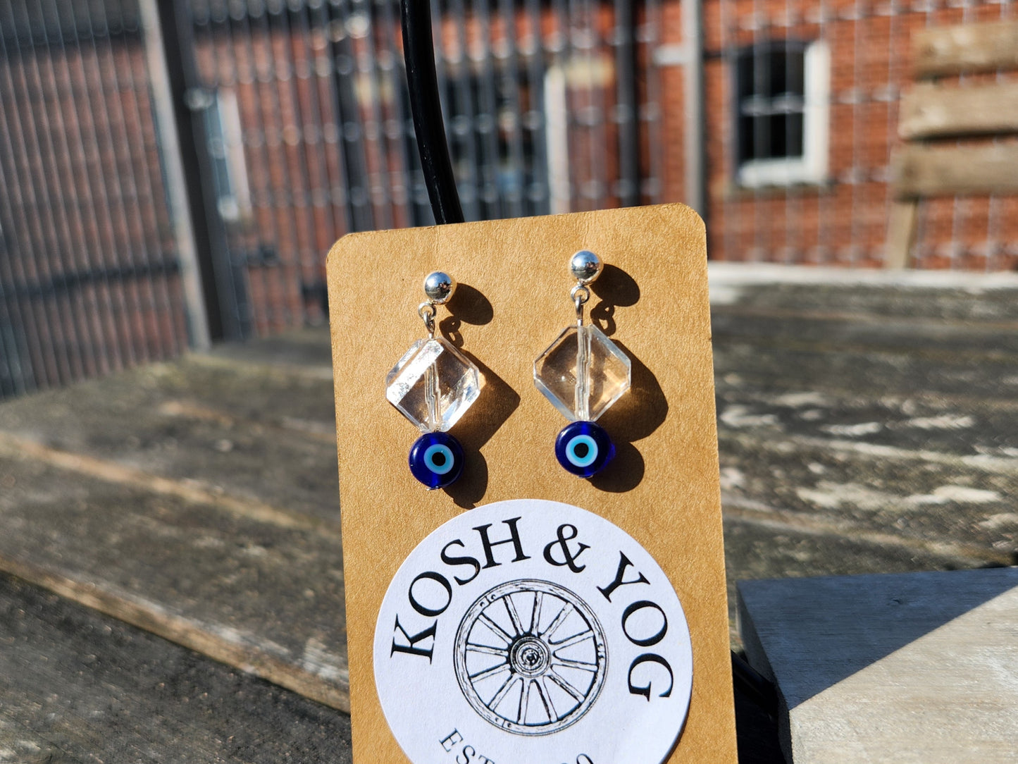 blue evil eye and clear glass beaded silver stud earrings