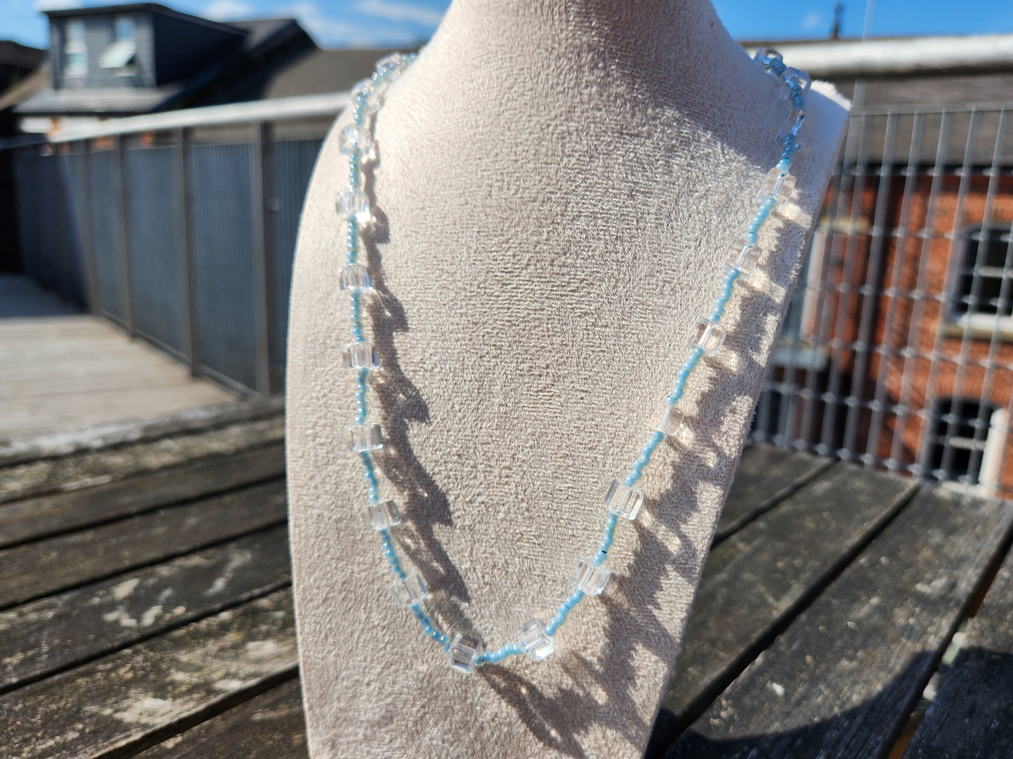 clear cube and blue glass beaded necklace