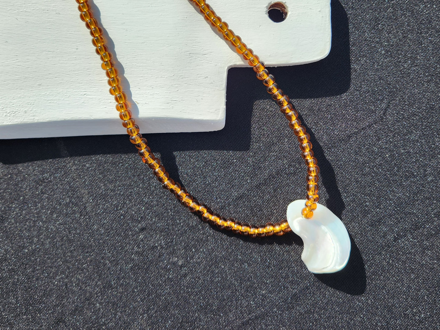 brown glass beaded shell pendant necklace