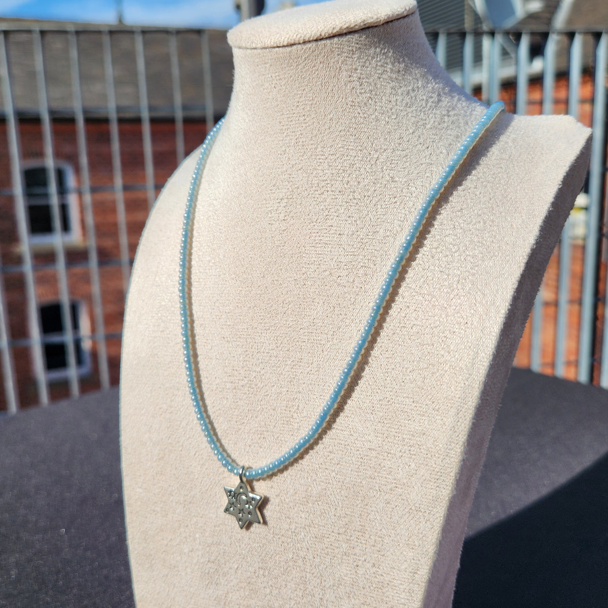 light blue silver star of david glass bead necklace