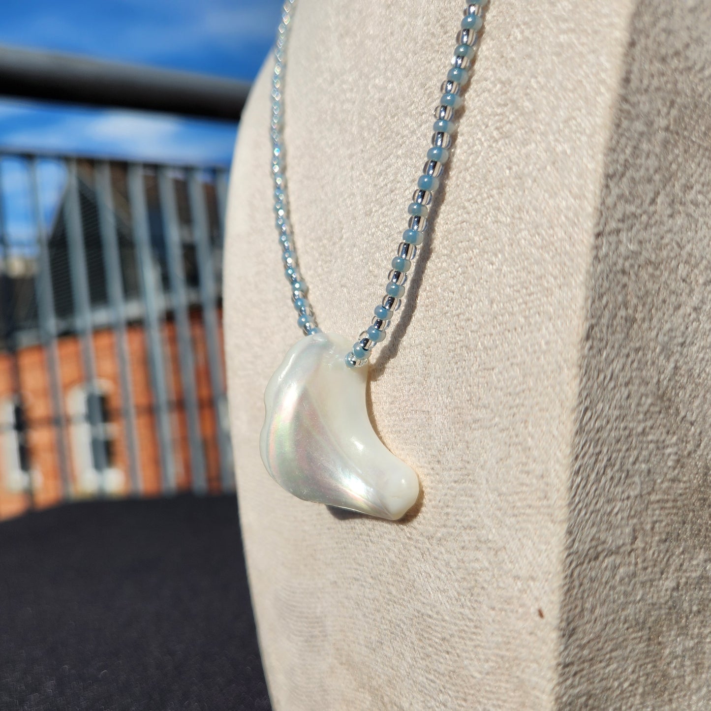 pale blue and silver glass beaded shell necklace