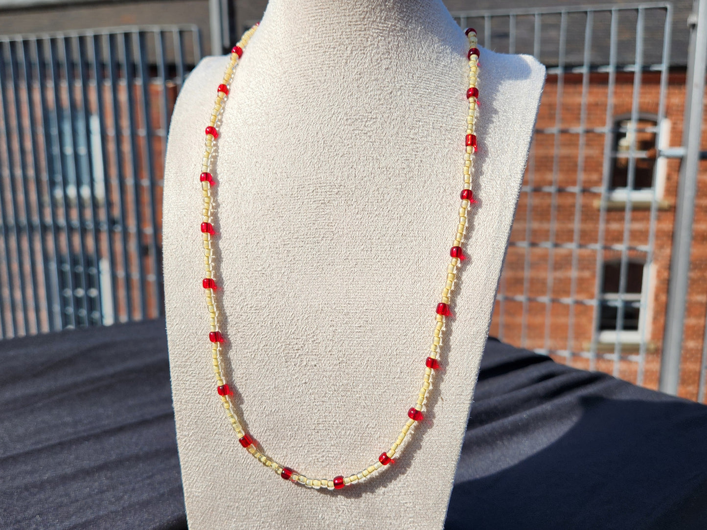 yellow and red glass beaded necklace