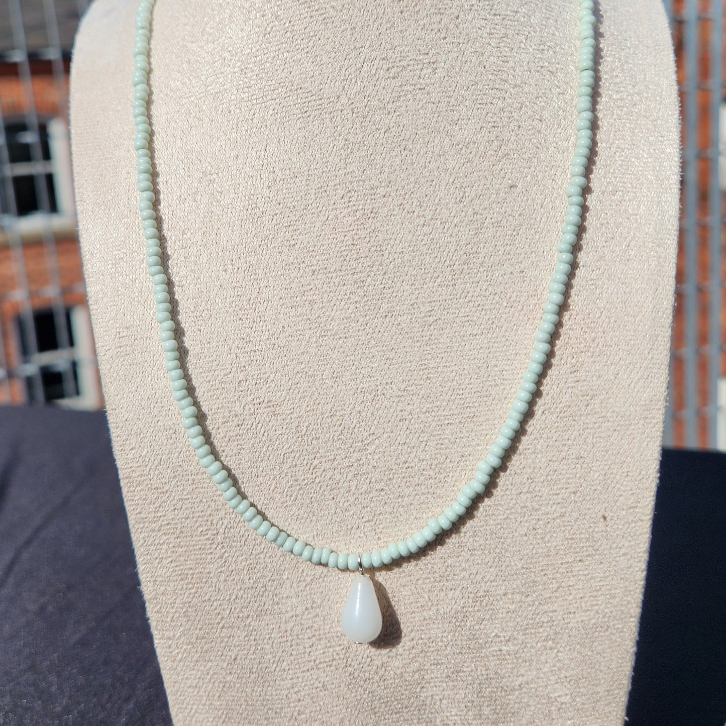 white and pale green upcycled glass beaded necklaces