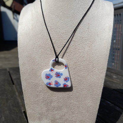 purple flower heart clay pendant