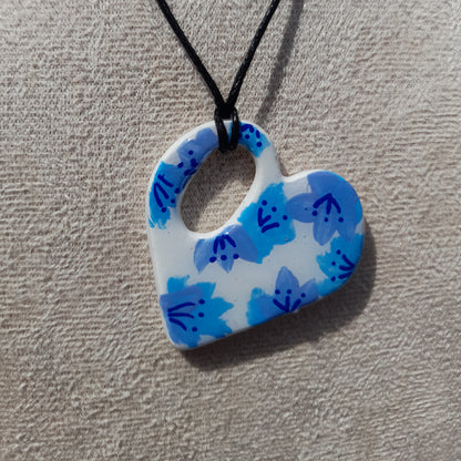 blue painted flowers heart necklace
