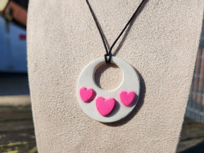 white and pink raised hearts clay pendant necklace