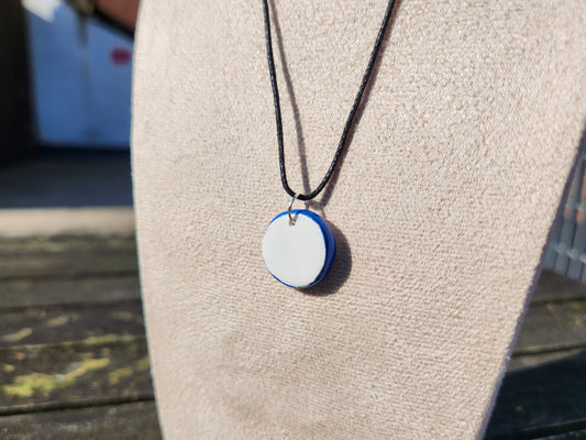 small white and blue circle clay charm necklace