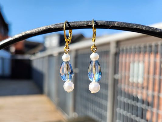 white and blue beaded gold huggie earrings
