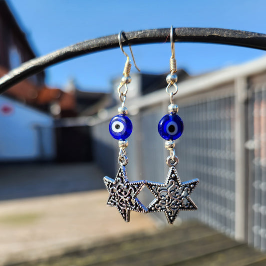 blue evil eye bead silver star earrings
