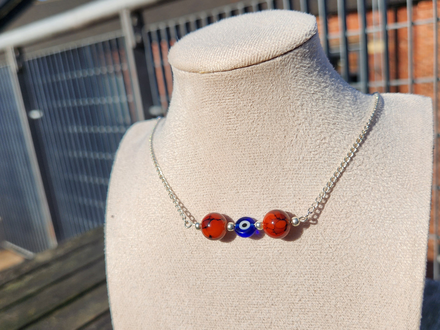 red and blue evil eye beaded silver chain necklace