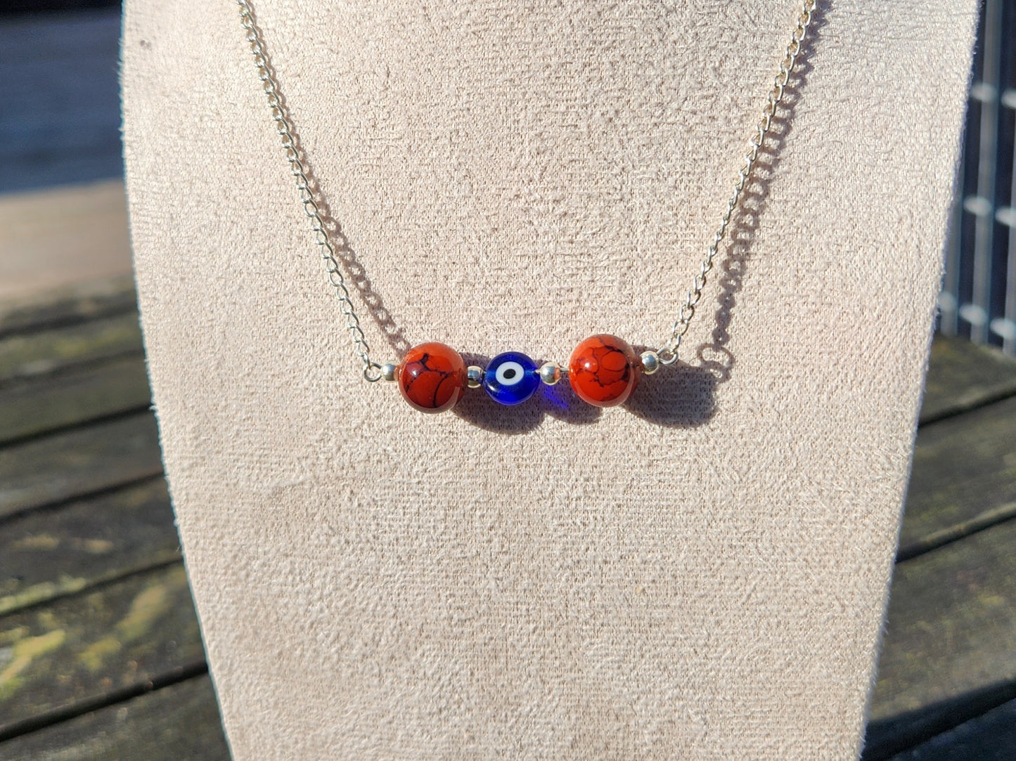 red and blue evil eye beaded silver chain necklace