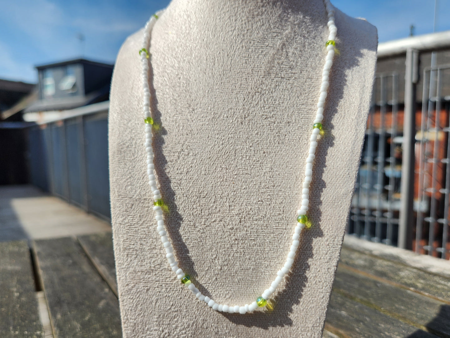 white and green glass beaded necklace