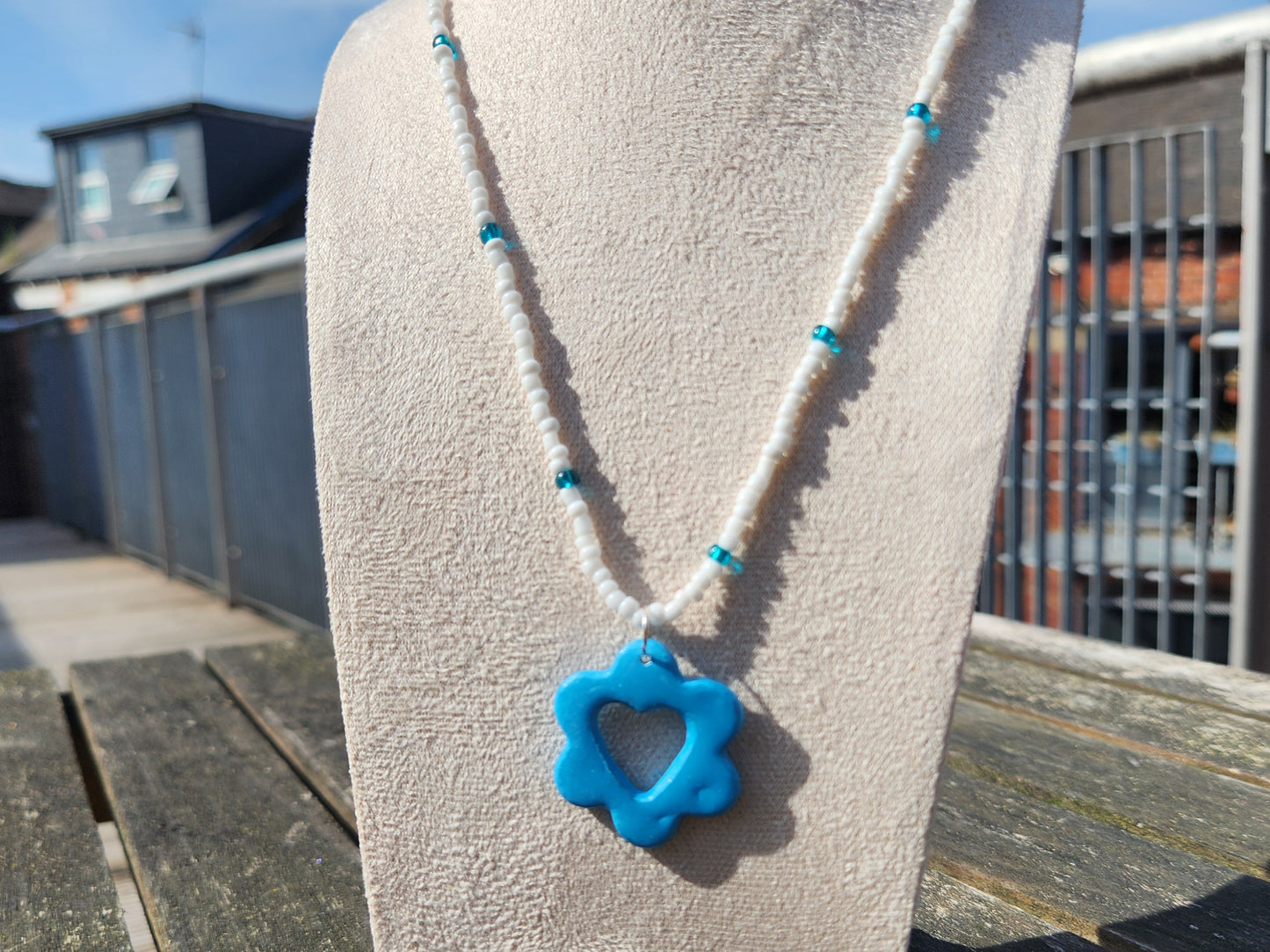 blue and white glass beaded blue heart flower pendant
