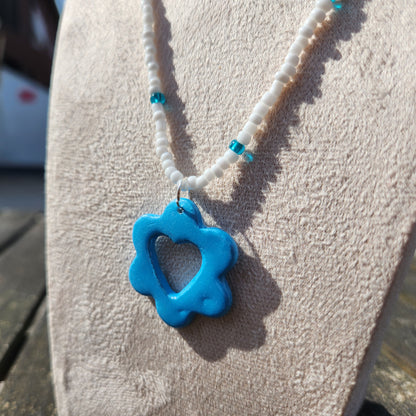 blue and white glass beaded blue heart flower pendant