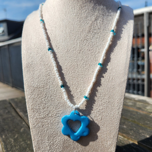 blue and white glass beaded blue heart flower pendant