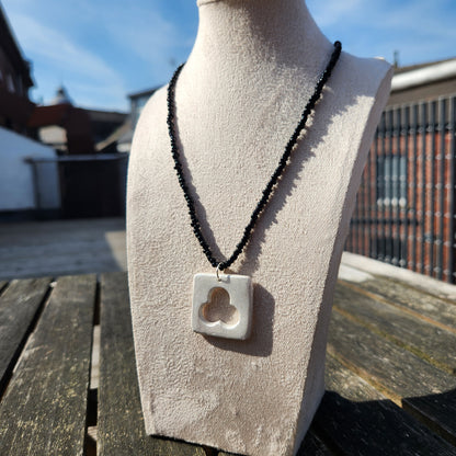 silver square clay pendant black glass beaded necklace