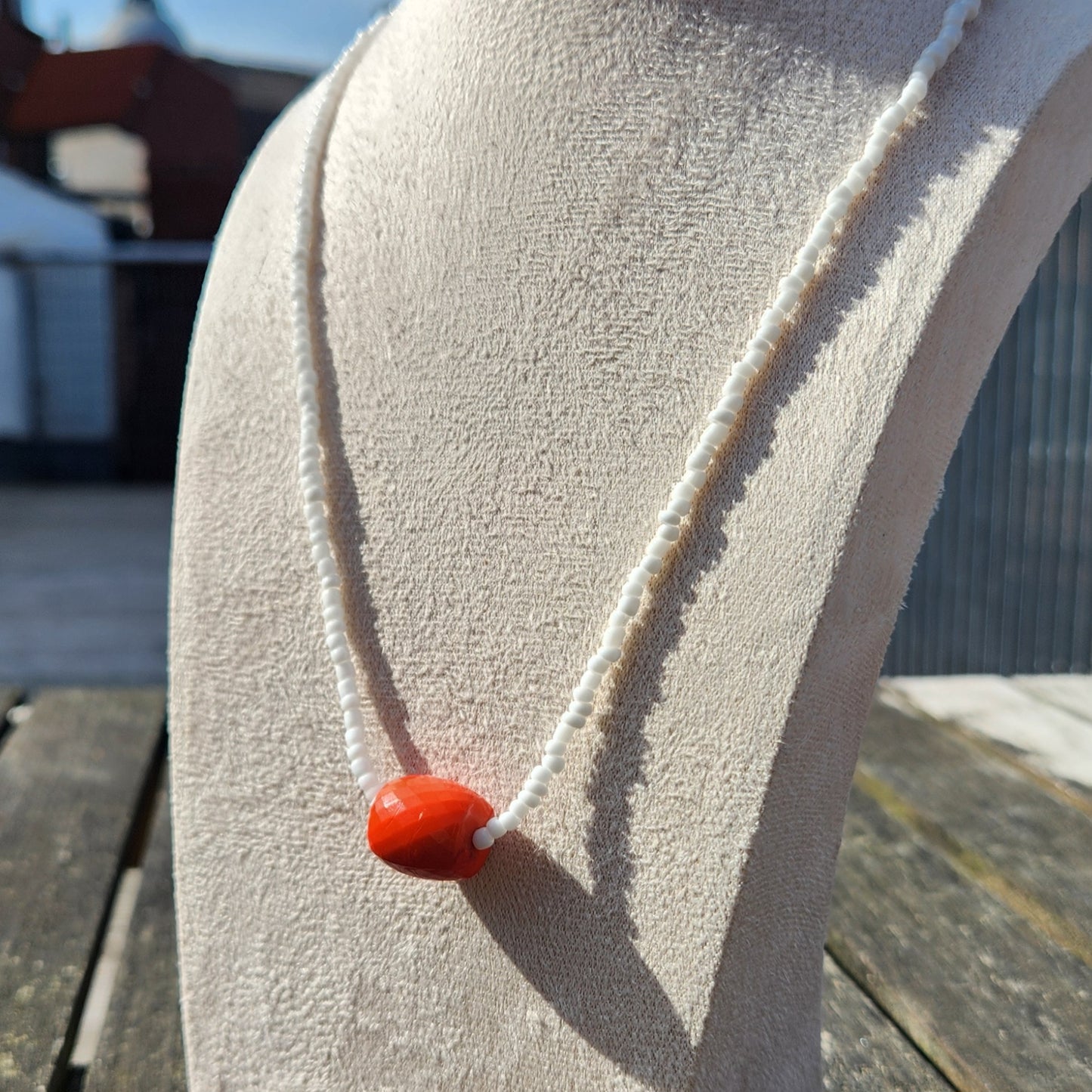 white and orange glass beaded necklace