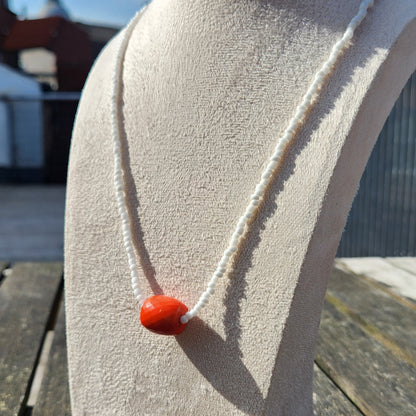 white and orange glass beaded necklace