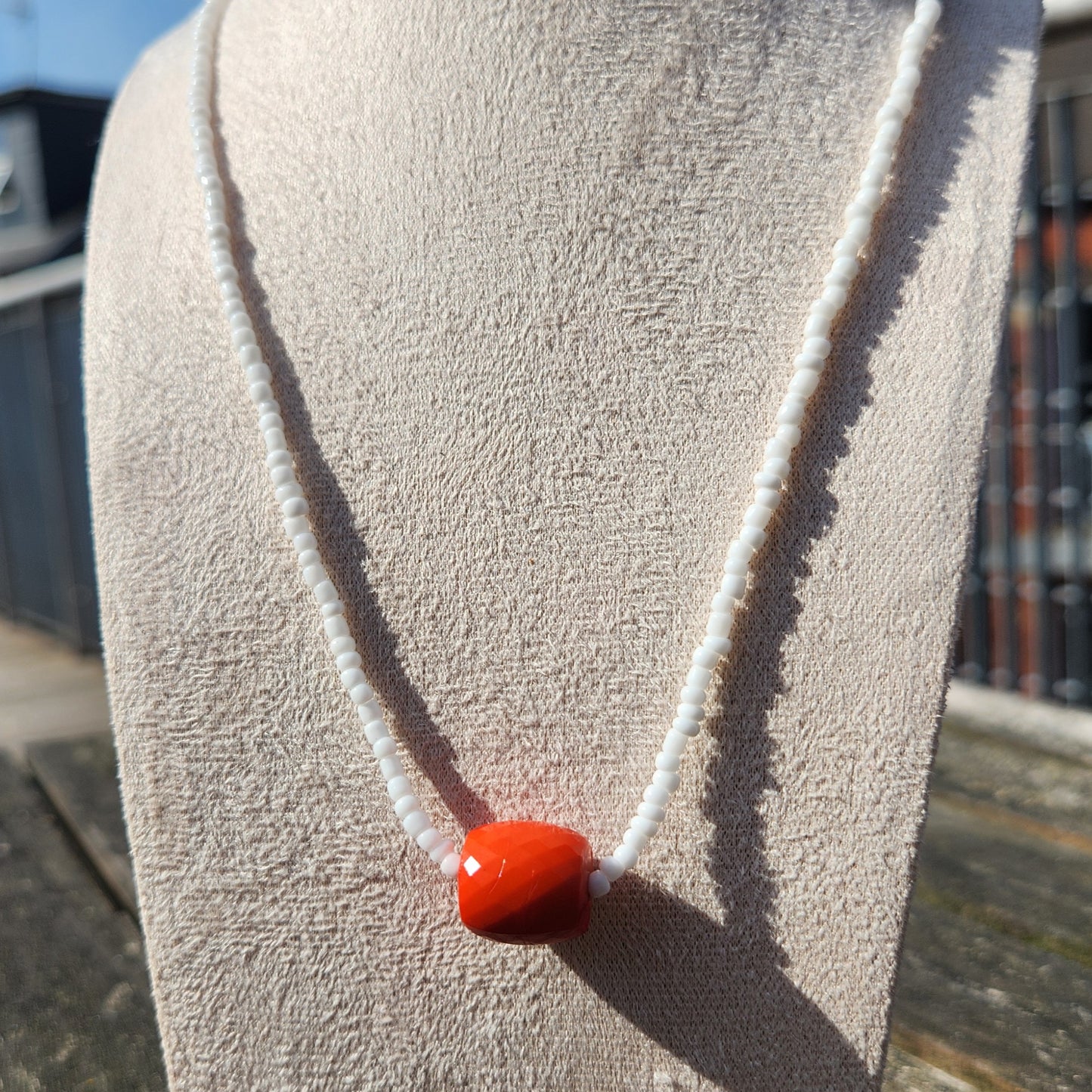 white and orange glass beaded necklace