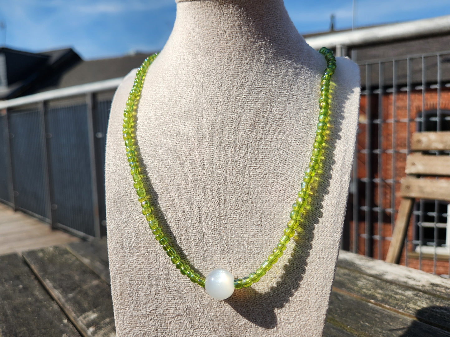 green and white pearlescent glass beaded necklace