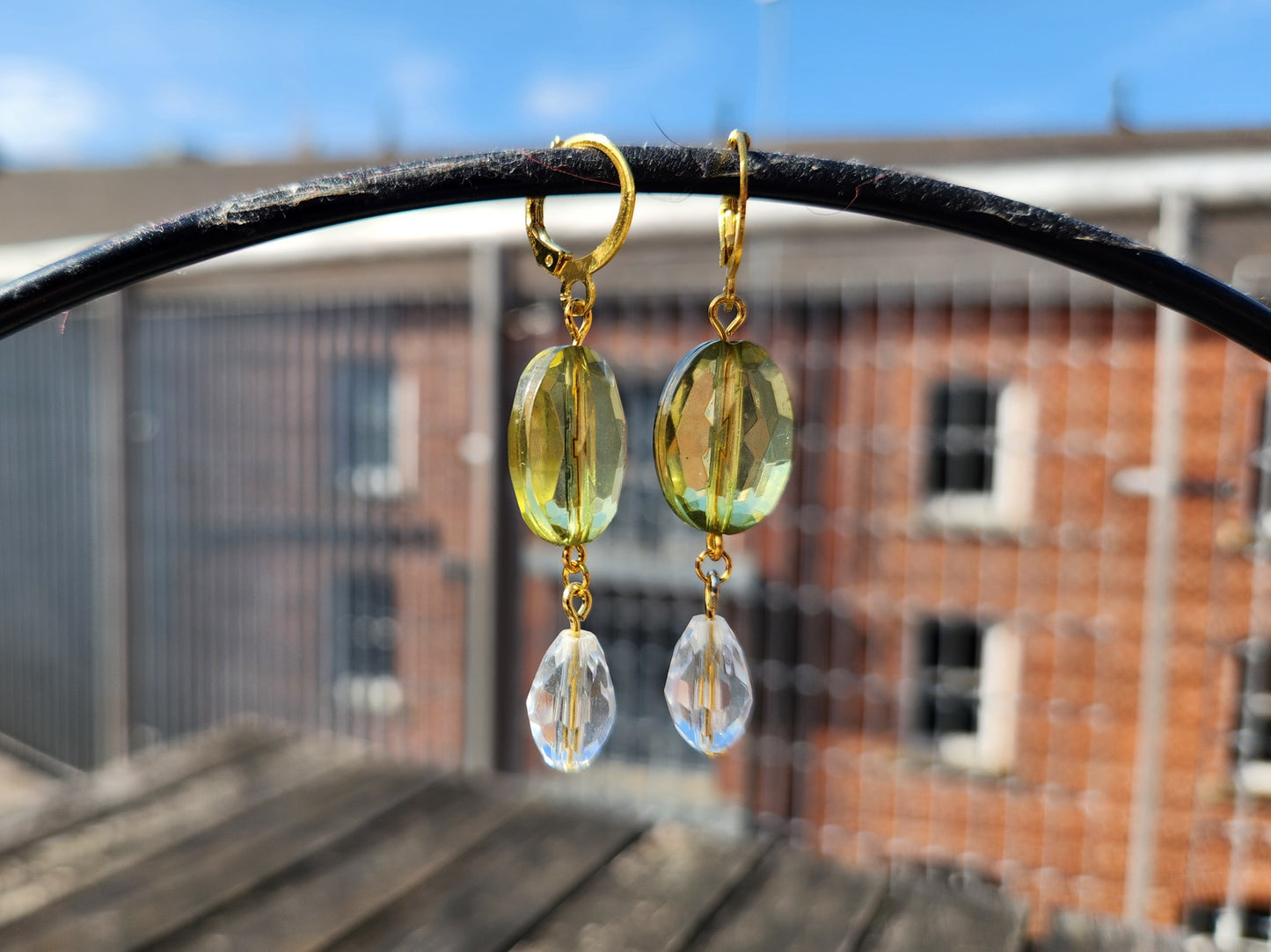 green and clear beaded gold huggie hoop earrings