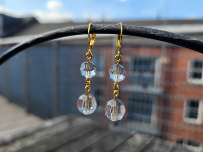 blue-grey faceted bead gold huggie hoop earrings