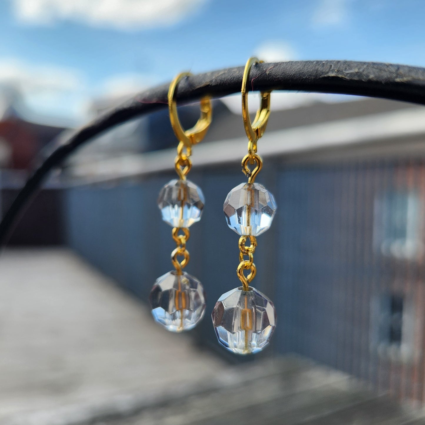blue-grey faceted bead gold huggie hoop earrings