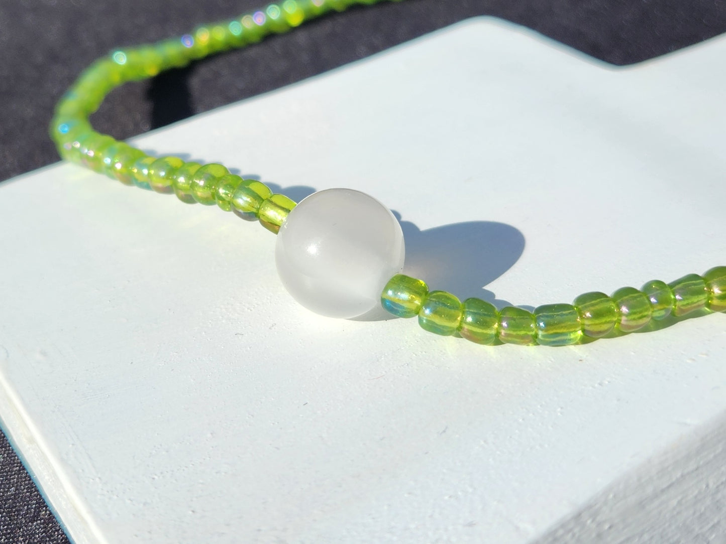 green and white pearlescent glass beaded necklace