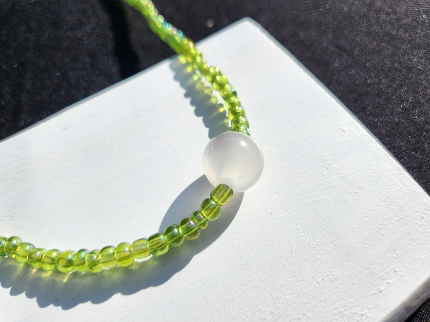 green and white pearlescent glass beaded necklace