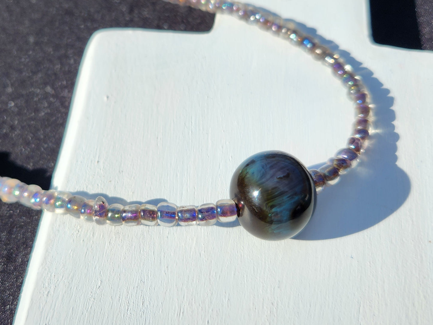 grey and blue iridescent glass beaded necklace