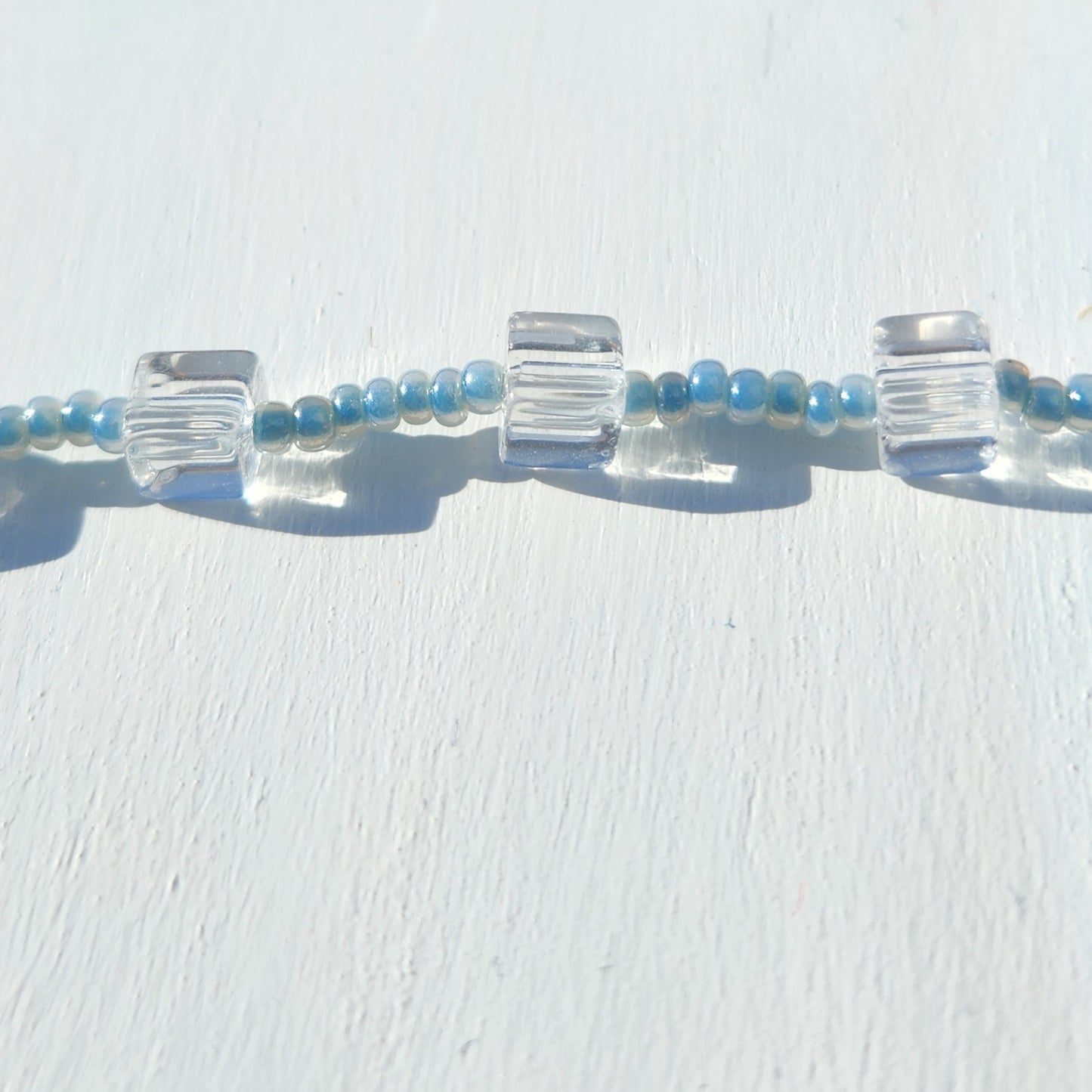 clear cube and blue glass beaded necklace