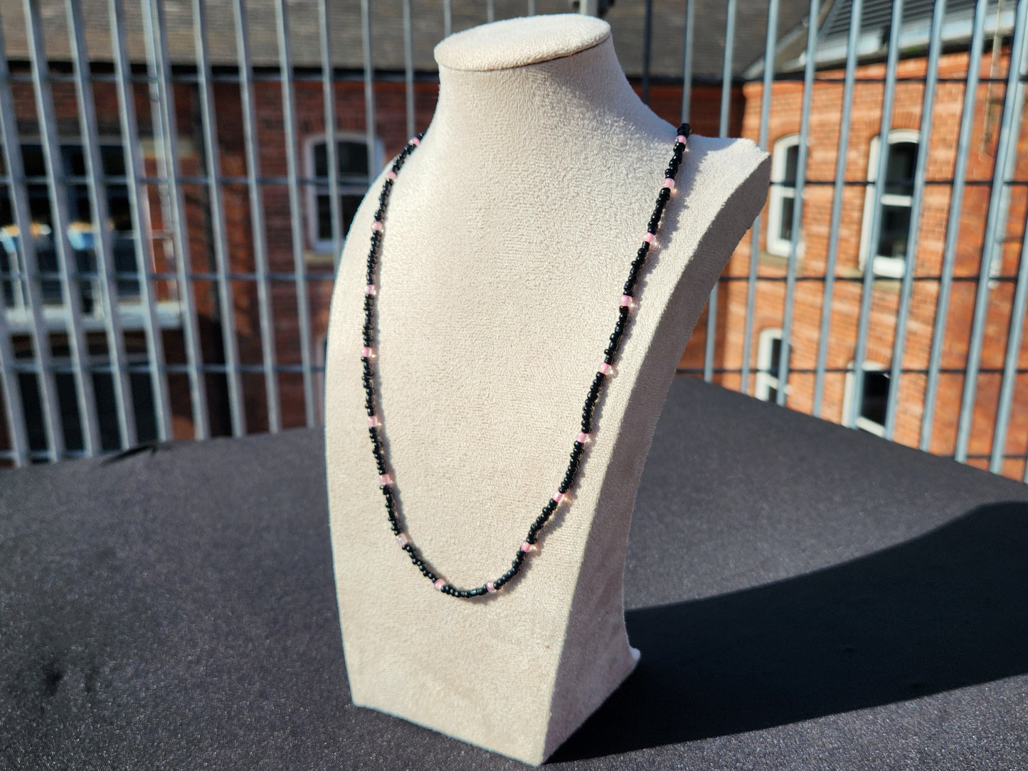 black and pink glass beaded necklace