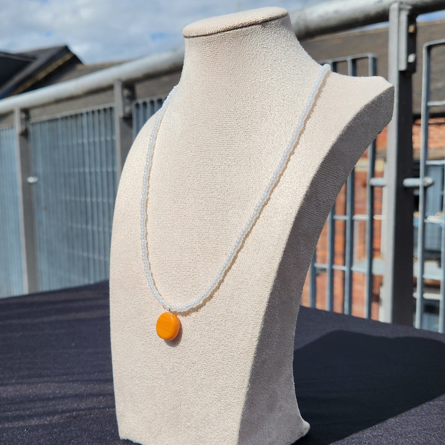 white and orange upcycled glass beaded necklace