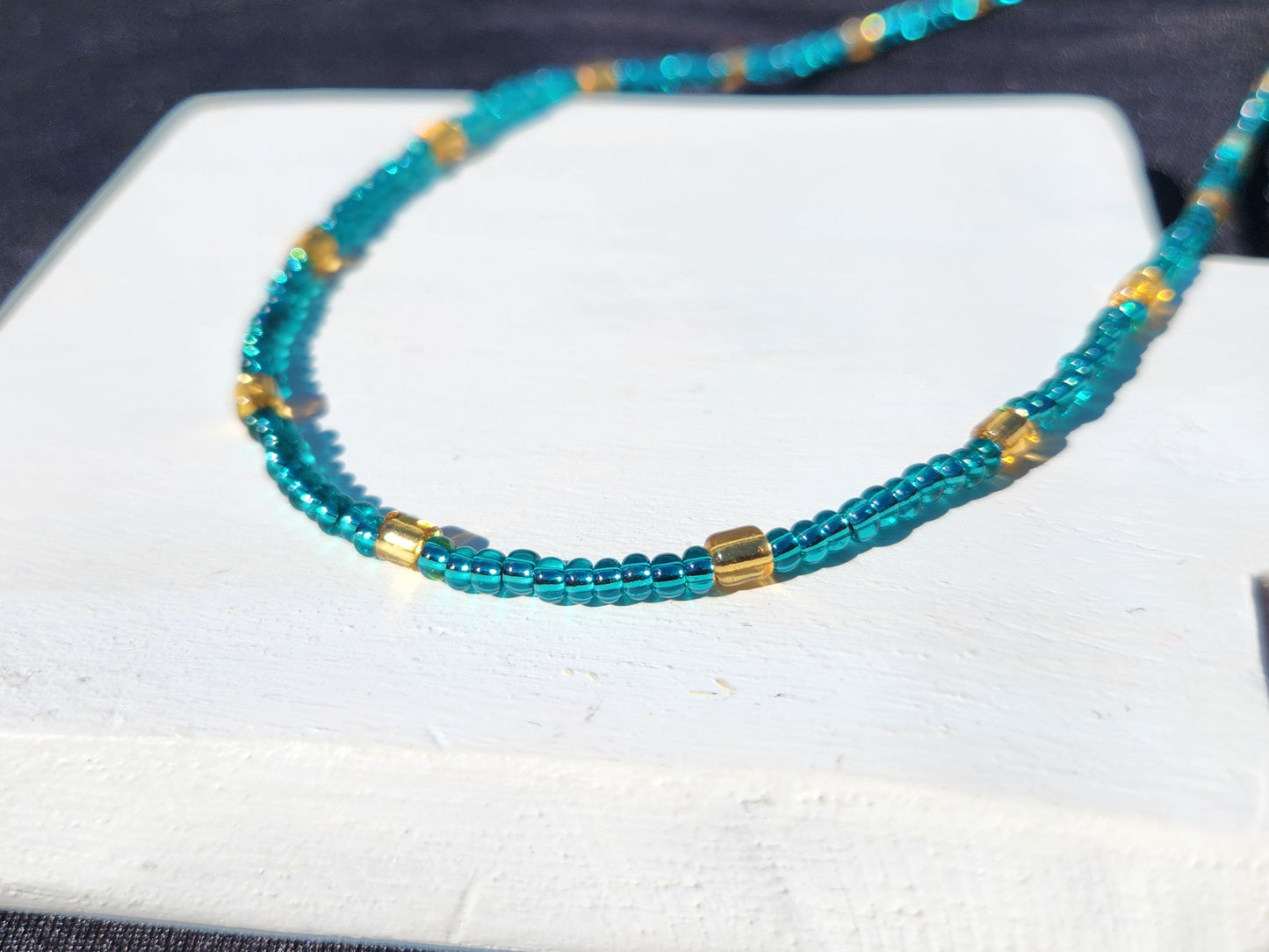 blue and gold glass beaded necklace