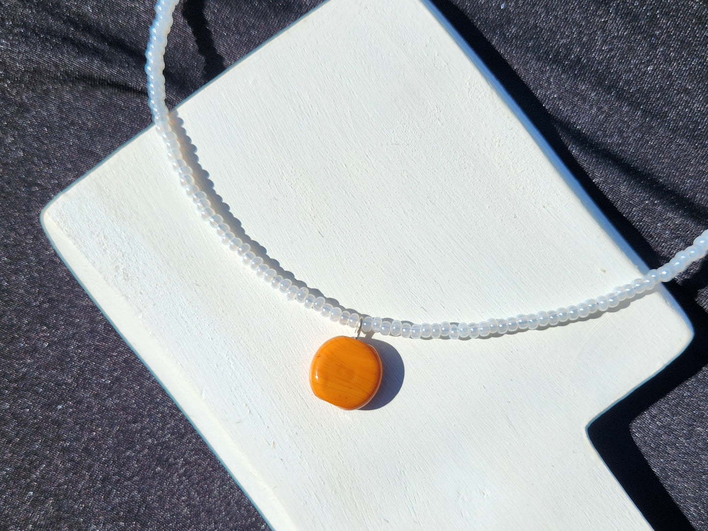 white and orange upcycled glass beaded necklace