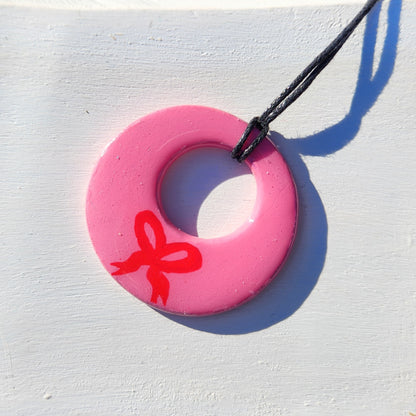 pink bow clay pendant necklace & sticker sheet [KOSH & YOG x AJAIBGHAR]