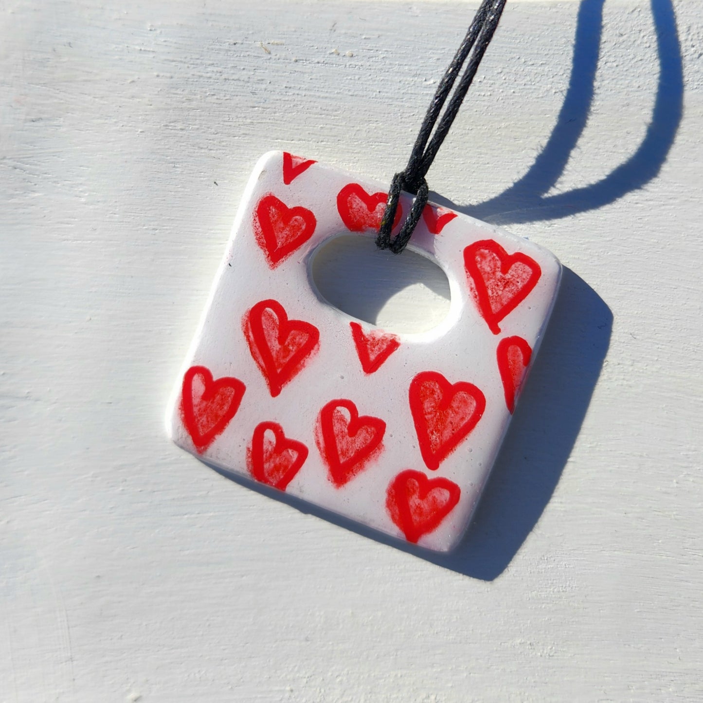 red hearts square clay pendant necklace & sticker sheet [KOSH & YOG x AJAIBGHAR]