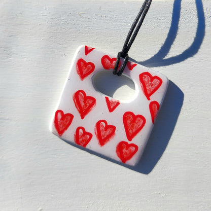 red hearts square clay pendant necklace & sticker sheet [KOSH & YOG x AJAIBGHAR]