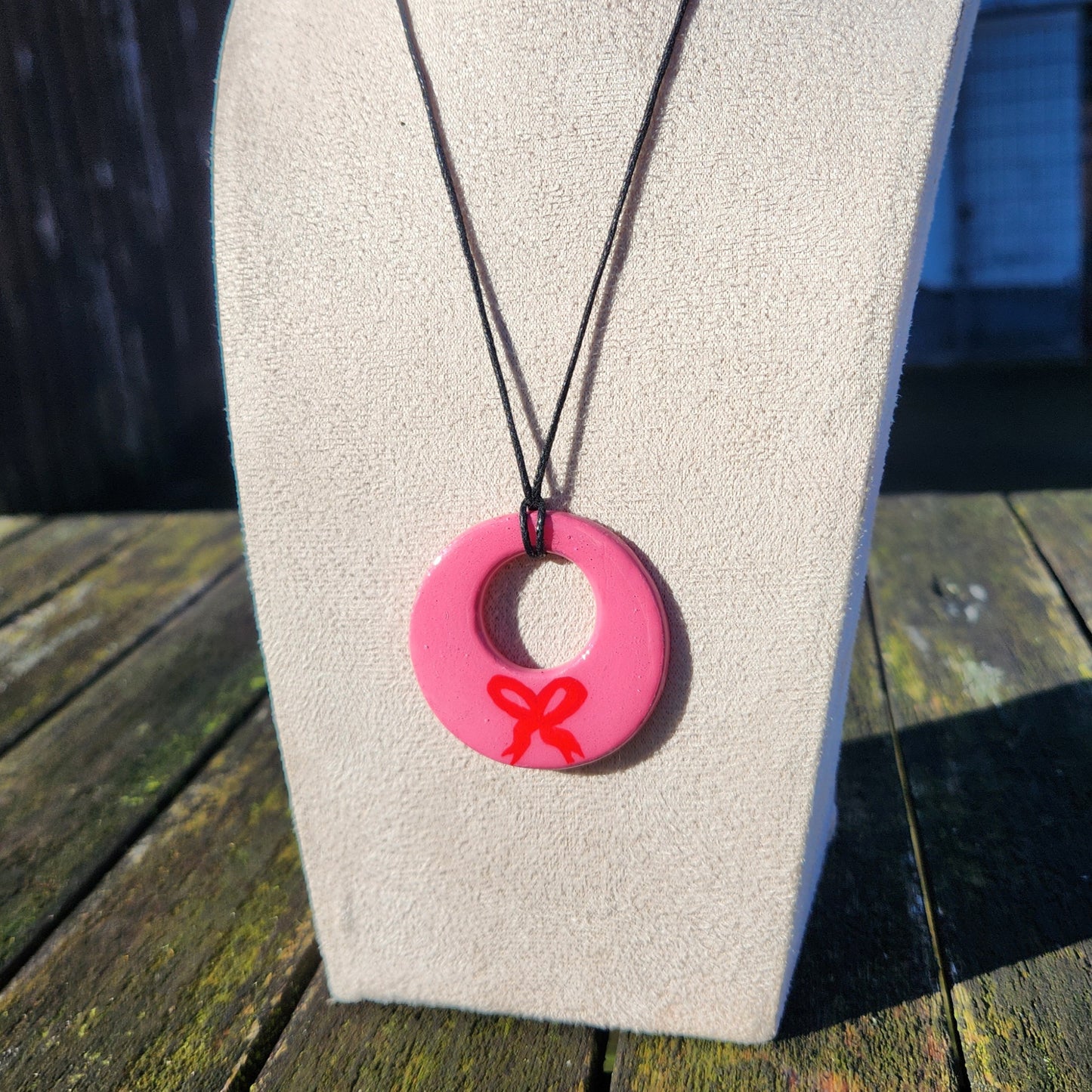pink bow clay pendant necklace & sticker sheet [KOSH & YOG x AJAIBGHAR]