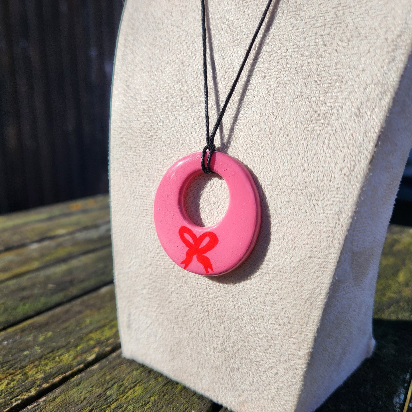 pink bow clay pendant necklace & sticker sheet [KOSH & YOG x AJAIBGHAR]