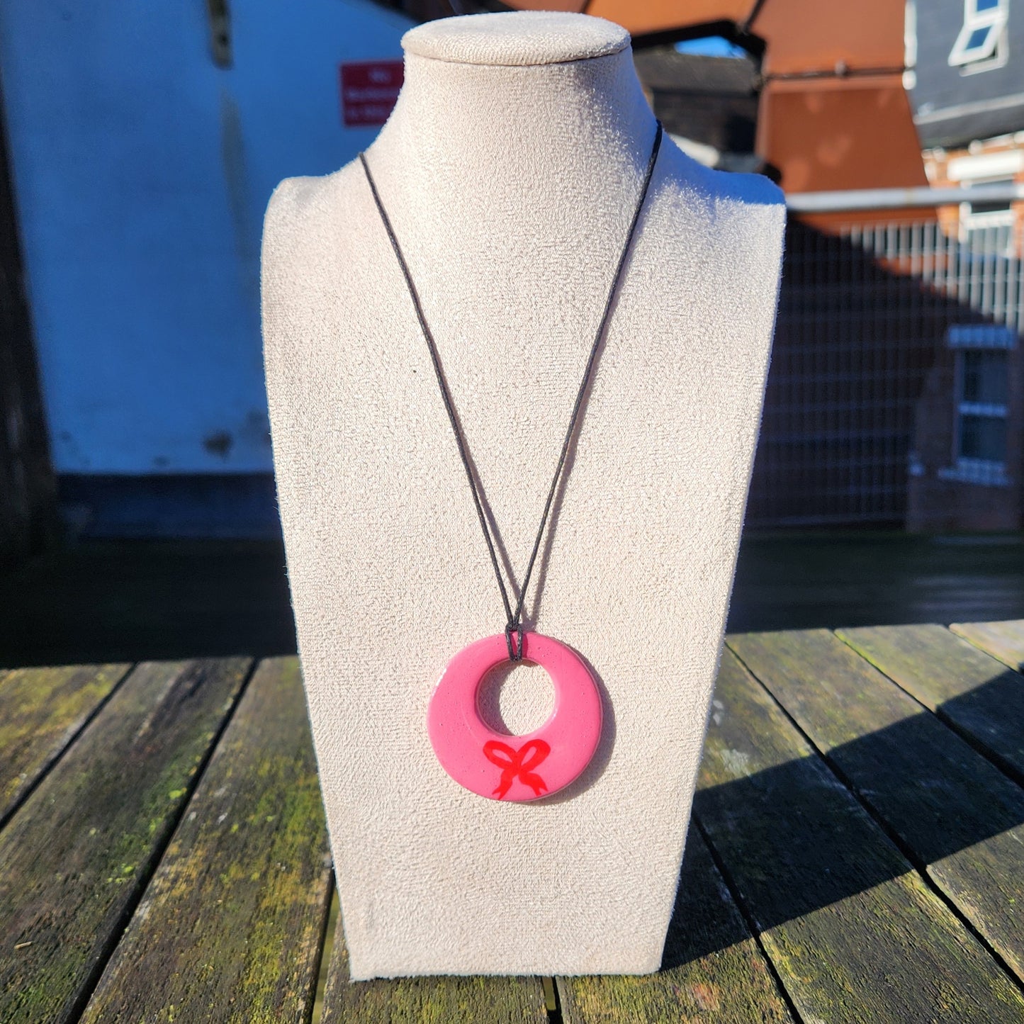 pink bow clay pendant necklace & sticker sheet [KOSH & YOG x AJAIBGHAR]