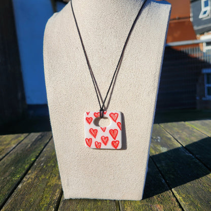 red hearts square clay pendant necklace & sticker sheet [KOSH & YOG x AJAIBGHAR]