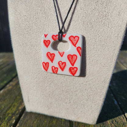 red hearts square clay pendant necklace & sticker sheet [KOSH & YOG x AJAIBGHAR]